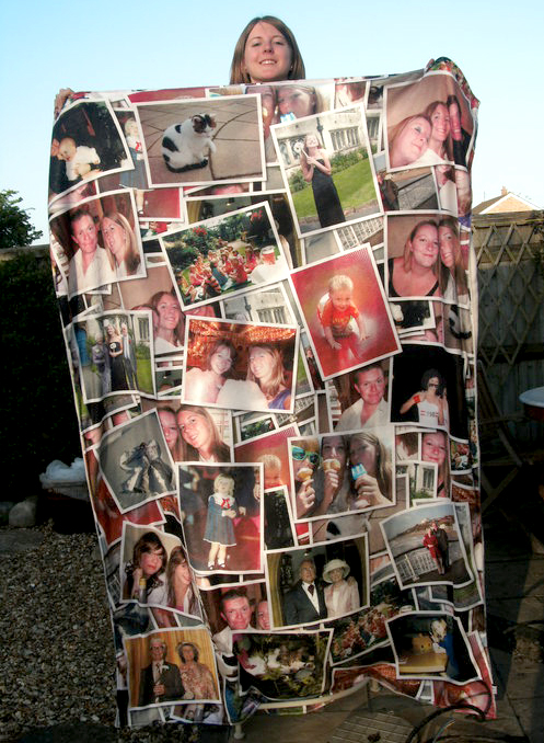 Woman holding a large photo montage blanket