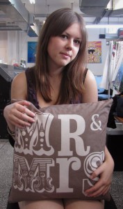 mr-and-mrs-cushion Woman holding mr and mrs cushions