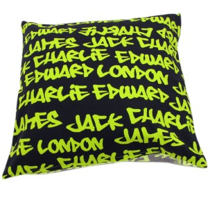 neon green graffiti handbag Black cushions with neon green graffiti words