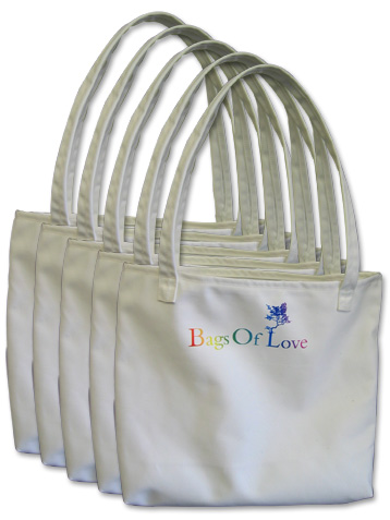 Five white shopper bags with bags of love written on them