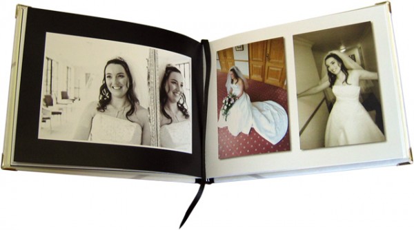 Open photo book displaying a woman on her wedding day