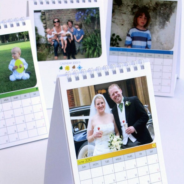 Four A6 size calendars with four different photos