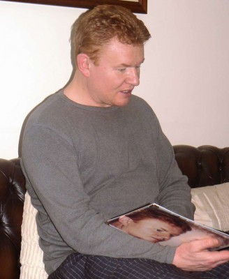 photo book A man holding a photo book