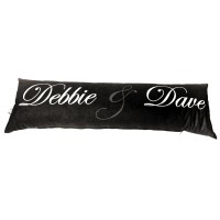 Debbie and Dave written on a black bolster cushion