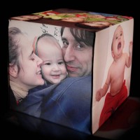 Photo light cube with different images of a family with baby