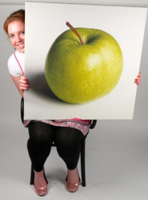 Bags of Love employee holding apple canvas print