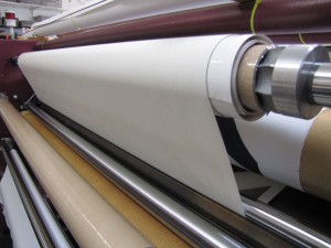 Roll of canvas on printer machine