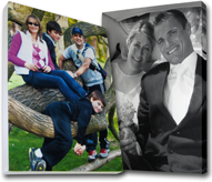 One canvas print with a family on it and one black and white canvas print with a couple on it