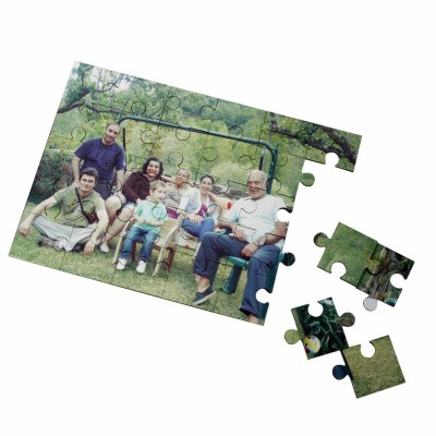 Family sitting in a garden on a jigsaw puzzle