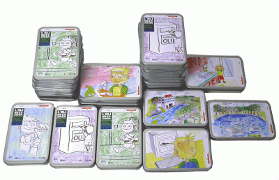 Piles of tin boxes with cartoon images on them