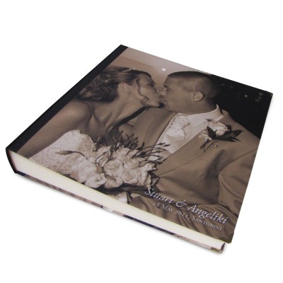 Man and woman on their wedding day on a sepia coloured photo album