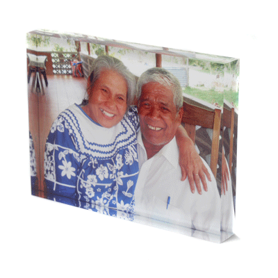 Man and woman embracing on a 3D acrylic photo block