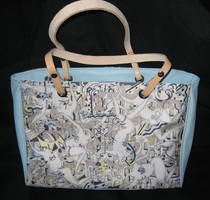 Hand made artwork pattern on a blue handbag