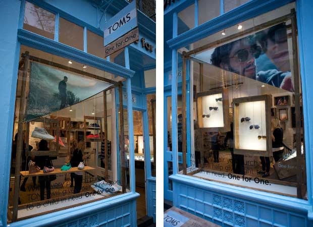 Both sides of the window display with photo banners in TOMS store in Covnet Garden