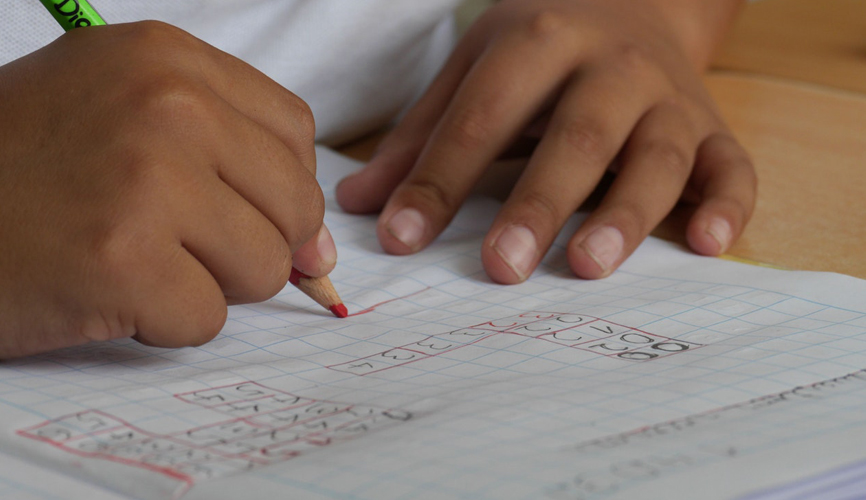 child doing his school work